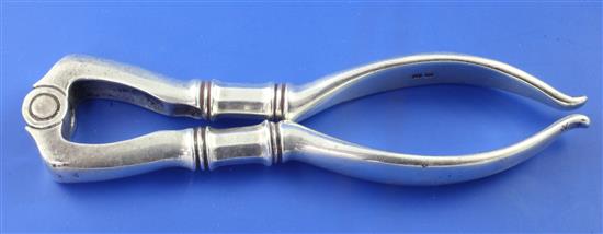 Two pairs of George V silver nut crackers by Collins & Co, (Dryad Art Metal Works), 8.5 oz.